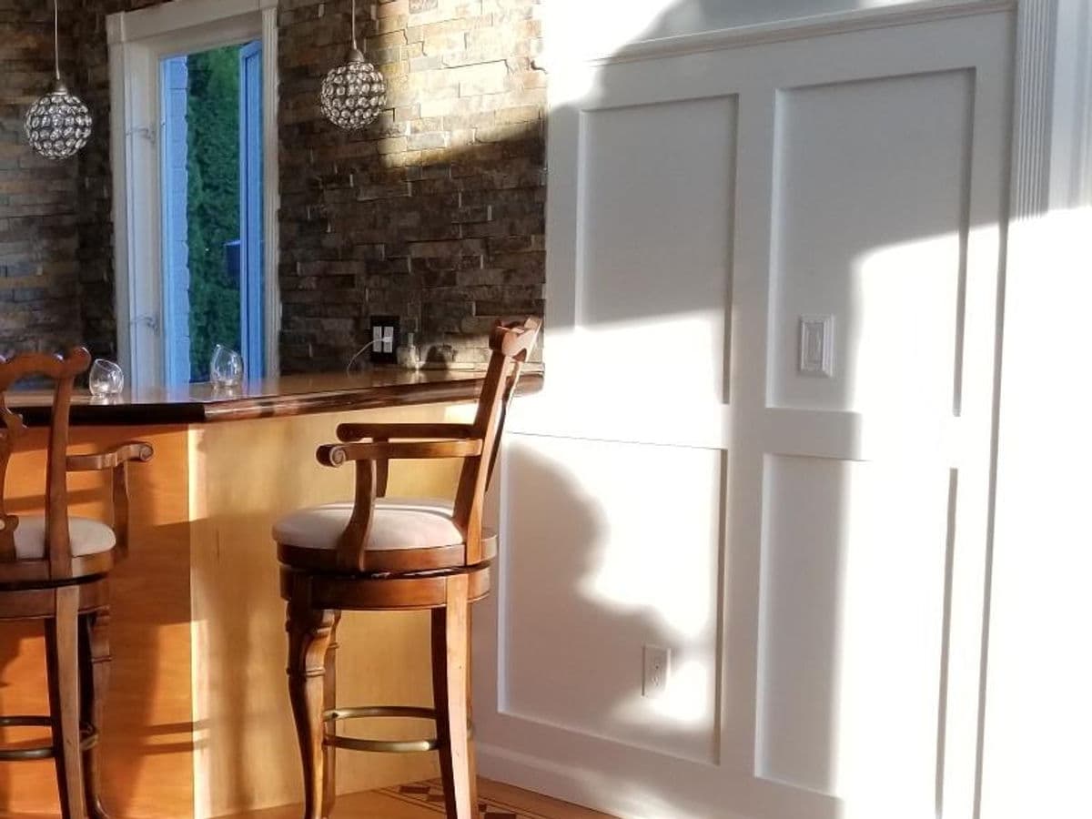 Wainscoted Great Room & Wet Bar — photo 11
