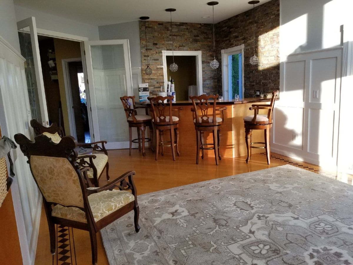 Wainscoted Great Room & Wet Bar — photo 12
